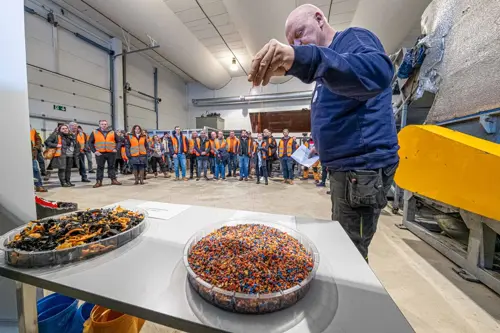 PE and PP are ground into particle-sized granules like beads. Visitors to Hallingtreff viewing the existing facility.